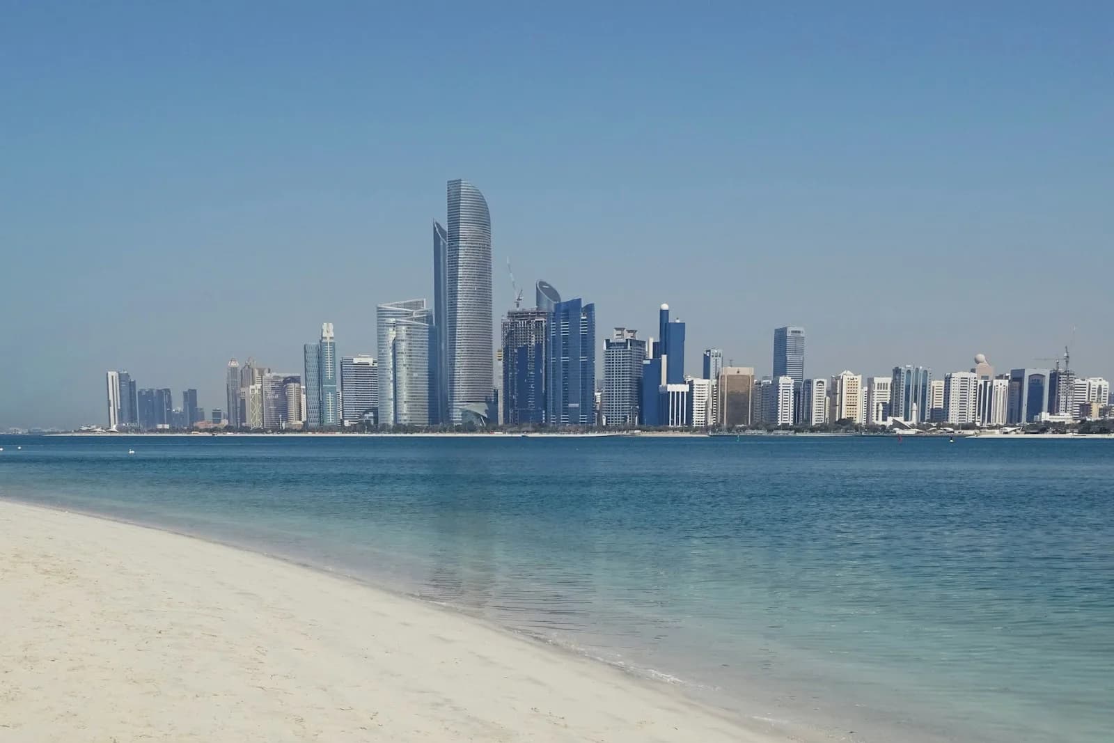 Abu Dhabi skyline across the water from the Al Bateen / Corniche shore
