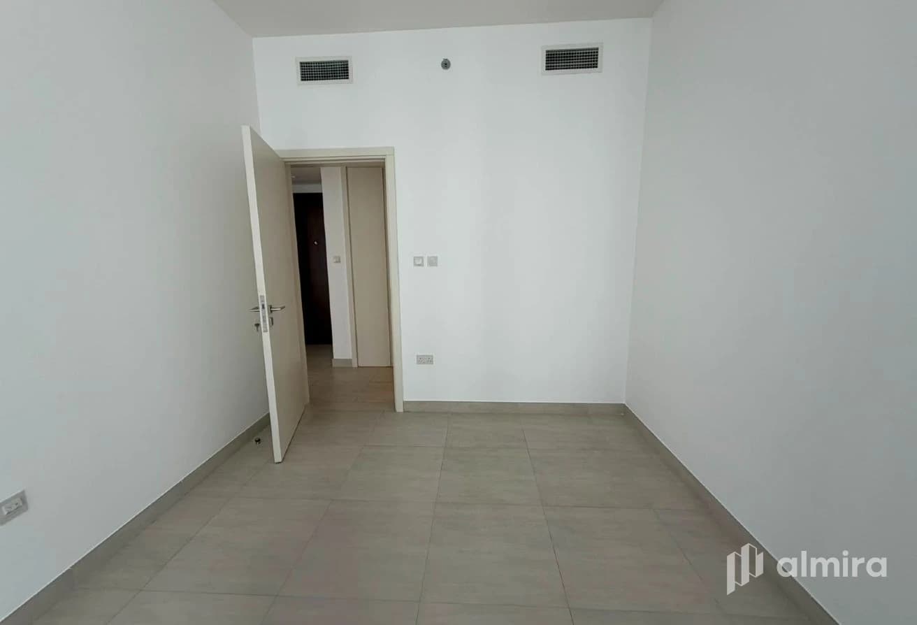 Partial Canal View | Highly Maintained | Low Floor